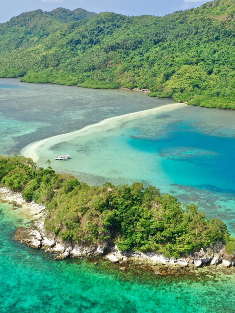 Snake Island sandbar winding through clear water on El Nido Tour B