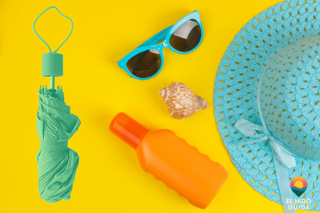 Green-season beach packing essentials flat lay for El Nido