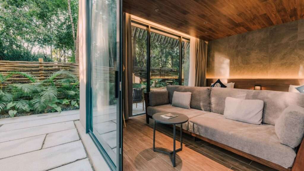 Presidential Suite with Garden at Piece Lio El Nido, showing the separate living area